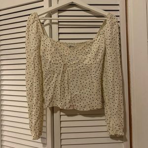 Cream and black dotted Reformation top
